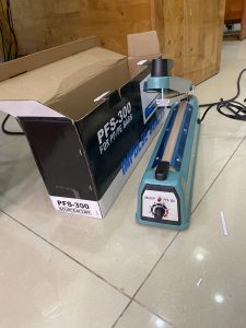 Hình ảnh thực tế máy hàn miệng túi PFS-300 mới full hộp